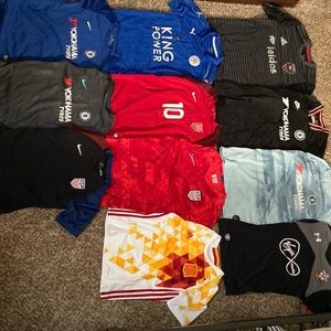 Soccer jerseys ranging in sizes from YM-YXL
